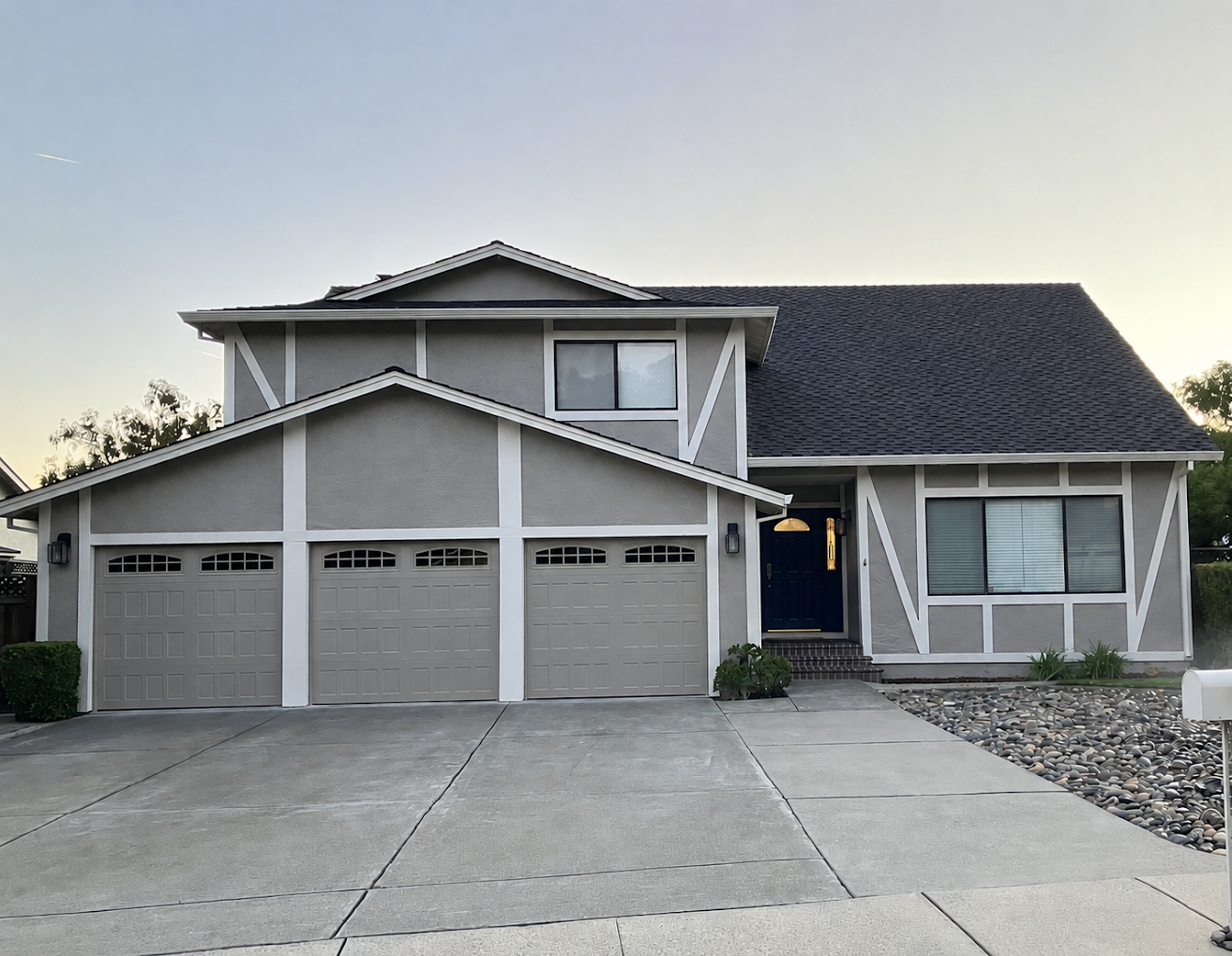 Modern two-story stucco home exterior painting